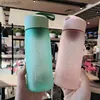 Bouteilles d'eau Tasse de sport minimaliste 580 ml en plastique portable tasse pratique créative étanche à la chaleur bouteille d'eau avec échelle yq240320