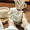 Caffettiere Tazze in ceramica stile country Tazze intagliate botaniche Tazza da tè al latte Tazza di farina d'avena Colazione Ins Coreano Bicchieri Cucina