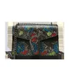 Grenzüberschreitende Großhandelshandtaschen der Modemarke Damentasche Neue Mode-Head-Lock-Textur bedruckt Kleiner quadratischer Kettenriemen One-Shoulder-Crossbody