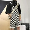 Plus storlek XXL Kvinnor Män Checkerboard Plaid Kort Jumpsuit overaller Knappremmar Romper Hip Hop PlaySuit Casual Loose Suspender 240306