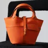 Top Luxury Bucket Bag Designer -Tasche Frauen Gemüse Bag Tasche Mode Tasche Tasche Kordelzug Taschen Handtaschen Top -Qualität handgefertigtes Spezialschloss mit legendären Buchstaben