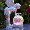ガーデンデコレーションソーラーランプ屋外の防水輝く妖精の女の子のLEDライト樹脂天使のフィギュア彫刻クラフトヤード装飾アート飾り