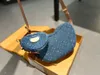 Bolso de guisante vintage de mezclilla Bolso de hombro de diseñador para mujer Bolso cruzado vintage Cartera de mano Estampado clásico Bolso de lona de mezclilla azul