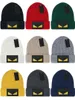 luxe mode schedel caps gebreide mutsen winter designer hoed met kleine monster labeling warme wollen muts unisex pet 16 kleuren hoge kwaliteit