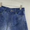 Kobiety szorty 2024 Spring/Summer American Retro Denim z kontrastującymi liniami wysokiej i linii A-line szeroko nogi spodnie