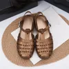 Sandalen van hoge kwaliteit dames retro geweven jelly schoenen zomer dames platte hak holle strand volwassen meisjes Romeins