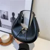 Groothandel detailhandel merk mode handtassen damestas nieuwe onderarm gepersonaliseerde kleine standaard enkele schouderstijl handheld trend