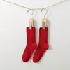 2 paia di calzini in cotone traspirante con lettera dorata con stampa di calzini in cotone natalizio per ragazzi e ragazze unisex
