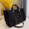 Bolsos de noche clásicos de diseñador Bolso de lujo Moda Perla Marca Etiqueta Mochila Bolsos de playa para mujer Monedero Bolso de mano de lona para mujer Bolsos de moda para mujer CH434