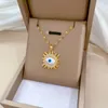 Naszyjniki inspirowane Sun Eye Naszyjnik dla kobiety Złotego CZ Ochrona szkliwa z słonecznikiem Unikalne akcesoria biżuterii 2024