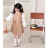 女の子のドレスベビーガールプレッピードレス子供の制服服2024スプリングキッズノースリーブ白い長袖ブラウス服