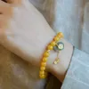 Guofeng Natural Chicken Oil Yellow Honey Wax Amber Bracelet Female Hotan Jade Money Lucky Bag Hand String Gift