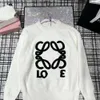 Designer Luxury loes klassiska män och kvinnor fashionabla och mångsidiga bekväma hösten ny pullover tung industri 3d handduk broderad stor stickad topp