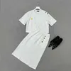 サマーTシャツスプリットドレスセットレタースカートメタルボタン装飾ゴールドレタープリントドレス2ピーススーツ