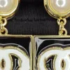 Luxury fashion high sense black and white enamel vintage do old craft gold earrings