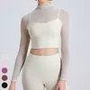 Quick drying yoga suit sexy and breathable mesh sports shirt, long sleeved top women's yoga cut top fixed padding