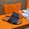 Top Hommes Pantoufles Designer En Cuir Izmir Flip Flop Oran Heritage Sandales En Cuir De Veau Été Paresseux Grande Plage Diapositives Occasionnelles avec boîte