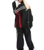 Pantaloni giacca a vento personalizzati di alta qualità Oem Pantaloni da donna in nylon nero Tute streetwear Tute patchwork unisex per uomo