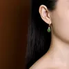 Kolczyki Dangle Oryginalne S925 Sterling Silver Natural Hetian Jade Green Ear Hook Ladies Kreatywna przystępna luksusowa moda
