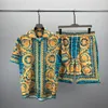 23SS Mens Designers Suitsuit Set الفاخرة الكلاسيكية للأزياء هاواي قمصان المسارات بالأناناس شورتات قميص بقميص قصير الأكمام #020