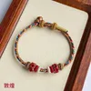 Braccialetti con ciondoli Bracciale in corda lavorata a mano con colori abbinati Dunhuang Fortuna Buona fortuna Rosso
