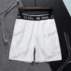 Sommarmän shorts stränder semester byxor män avslappnade solida fickor strand lös byxor streetwear elastiska midja byxor