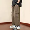 Pantalon pour hommes Multiple Pocket Hommes Vintage Cargo Lâche avec taille élastique Multi Poches Sangle Décor Doux pour Quotidien