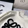 Designer Luxury loes klassiska män och kvinnor fashionabla och mångsidiga bekväma hösten ny pullover tung industri 3d handduk broderad stor stickad topp