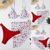 Traje de baño para mujer Traje de baño de tres piezas Sujetador acolchado Bikini Estampado de flores Cruz Corte bajo Playa Soporte de acero