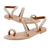 Sandalen Sexy Dames Kristal Casual Zomer Parel Platte zolen Mode Elegante Kantoorschoenen Dames Kruisband Strass