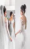 2020 Long Sleeve Mermaid Wedding Dresses Bridal Gowns Sheer Jewel Neck Lace Appliqued Buttons Back Robe de Mariee Arabic Wedding D5039671
