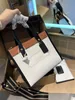 Designer novo couro de cor pura velho impresso fivela magnética ombro único oblíqua span sacola para mulheres mamãe saco de compras curto saco de viagem