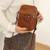 Axelväskor mode kvinnor pu läder crossbody vintage chic messenger med hörlurar jack påse för shopping