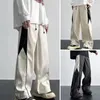 Pantaloni da uomo Pantaloni da uomo a gamba dritta a vita regolabile Pantaloni sportivi con coulisse a gamba larga con elastico in colore a contrasto sul cavallo