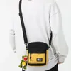 Väska kvinnor män duk axel messenger väskor små koreanska söta mode kvinnliga crossbody för tjej pojke 2024 tyg mini handväskor