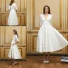 Lunghezza del tè Short A Line Beach Wedding Dresses v Neck Mewflees Abiti da sposa a buon mercato abito da sposa personalizzato