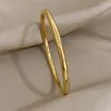 Bracciale classico in acciaio inossidabile con cerchio semplice e lucido per donna, semplice stile bassico, polsino da indossare ogni giorno, regalo di gioielli