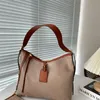 Luxury Bag Tote Hobo Läder axelväskor Kvinnor Handväska Dragkedja fickor Topphandtaget med stor kapacitet Crossbody