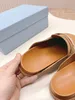 Femmes Soft Rempa en cuir nappa Sabots Slipper Designer Mode Mules Sandale Plateforme de luxe de haute qualité Scots décontractés Baotou Slippers Size 35-41