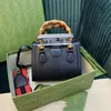 Topp Nya kvinnors väska bambu Joint Bag Black Weaving Strap Shoulder Strap Black Cowhide Open Handväska Single Shoulder Bag 702732