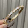 Explosief licht luxe mode temperament tij hoge slang bot armband witte fritilla armband vrouwelijke inzet zirkoon hand sieraden