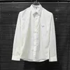 Camisas casuais masculinas designer 2024 início da primavera novo triângulo clássico padrão de ferro unissex homens e mulheres de manga comprida camisa branca e393
