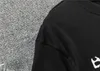 Designer de luxe pour hommes et femmes 2024 T-shirt pour hommes Été Col rond Bouton de verrouillage de la poitrine Logo Lettre Impression Pull en coton pur T-shirt personnalisé M-XXXL