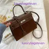 Hremms Kelyys Classic Designer Bag Bag Корейская легкая роскошная портативная портативная женщина 2024 Новый высококачественный маточный вариант с поперечным плечом имеет настоящий логотип