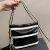 Torba designerska mini w paski torba na śmieci jedno ramię w łańcuchu Crossbody oryginalna skórzana torba premium dotyk torebka pozostań stylowa w podróży z naszą modną torbą zakupową