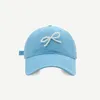 Ball Caps Koreaanse versie van Pearl Bow Baseball Cap Dames lente en zomer Niche Sweet Fashion Zonnescherm Verstelbare sporthoed