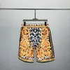 23ss Diseñadores para hombre Chándal Conjunto de lujo Clásico Moda Camisas hawaianas Chándales Pantalones cortos con estampado de piña Camisa Traje de manga corta # 019