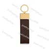 Porte-clés Longes 10 styles de porte-clés en cuir lettres en alliage sac de voiture pendentif mode couple porte-clés cadeau longue boucle accessoires fourniture