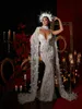 Exquisitos vestidos de novia de plumas Perlas Vestidos de novia de sirena Ver a través de apliques sin mangas Ilusión Vestidos de novia por encargo