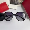 Femmes Designer Lunettes de soleil PC Cadre Miroir Jambe Lunettes de soleil de haute qualité Polaroid Objectif Lunettes de soleil Femme Grand cadre Lunettes de soleil avec boîte